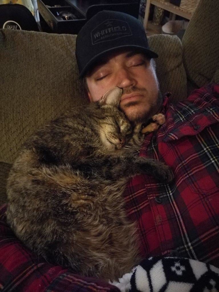 bella cat nasal tumor hugging her dad