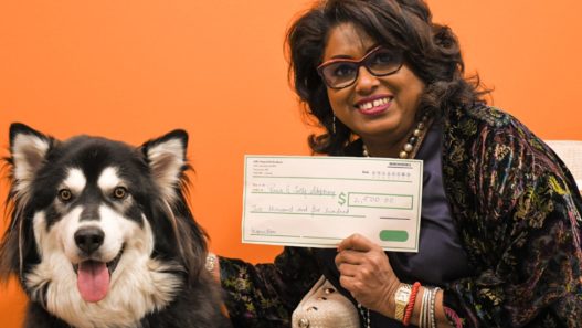 patra with the donation cheque