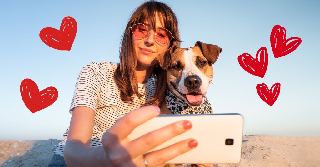 A dog and person taking a selfie.